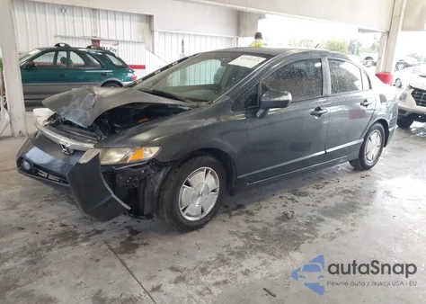 2006 Honda Civic Hybrid from USA, damaged, VIN JHMFA36216S023509